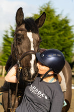 Load image into Gallery viewer, Horse rider kissing bay horse - Paddock Equestrian Apparel
